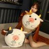 Gối mền bò uống trà sữa